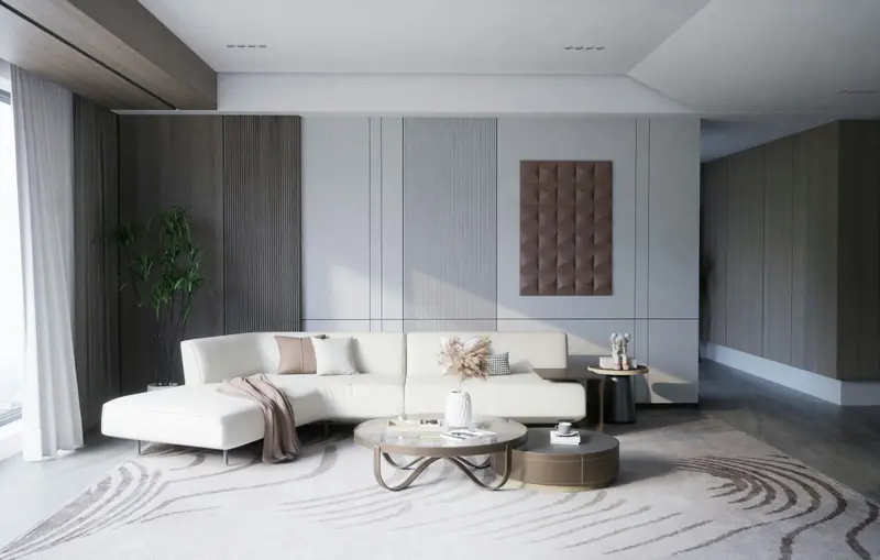 Séjour clair avec canapé blanc arrondi et tapis texturé